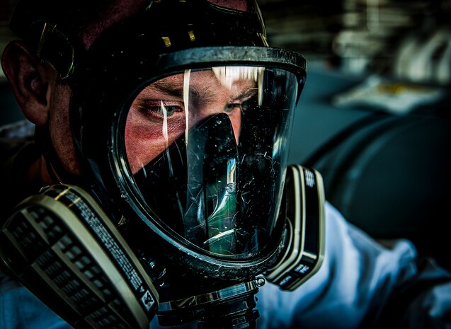 Airman 1st Class Nicholas McKinney, 437th Maintenance Squadron aircraft fuels systems apprentice, finishes suiting up in safety gear before descending inside a C-17 Globemaster III fuel tank, March 7, 2013, at Joint Base Charleston – Air Base, S.C.  Fuel System Repair Airmen maintain the fuel cells and tanks by removing, repairing and installing the cells and tanks. The Airmen also clean the cells and tanks, inspect for corrosion, cell deterioration, fungus and foreign objects. (U.S. Air Force photo / Airman 1st Class Tom Brading)
