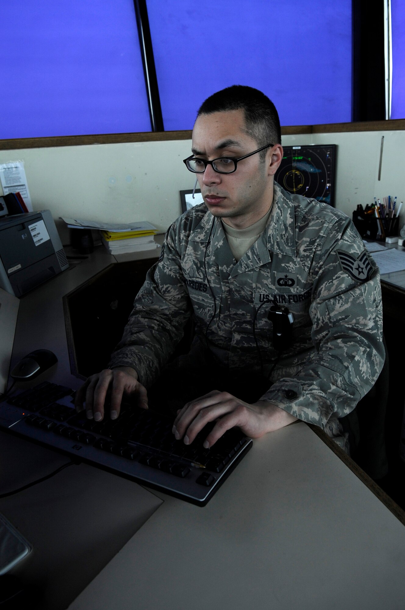 KUNSAN AIR BASE, Republic of Korea – Staff Sgt. Warner Paredes, 8th Operations Support Squadron air traffic control watch supervisor completes a runway change checklist at Kunsan Air Base, Republic of Korea, March 12, 2013. The 8th OSS recently won the Pacific Air Force’s 2012 Airfield Operations Flight Complex of the Year Award, and the air traffic control tower is one of the flights within 8th OSS. (U.S. Air Force photo by Staff Sgt. Tong Duong)