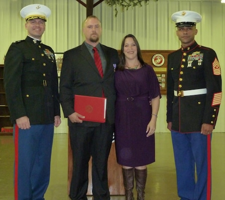 Cody E. Hammer, Geospatial Information Systems Specialist at Piney Woods Regional Project, was presented with a Purple Heart December 17, for wounds received in action on Aug. 19, 2011 while serving as a U.S. Marine in Afghanistan. The ceremony was held at the Marine Corps League Building in Longview, Texas, and was attended by his wife Katie and family, friends, and coworkers from Lake O' The Pines and Piney Woods Regional Project.