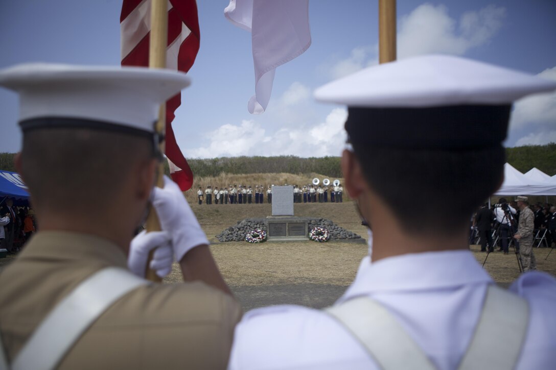 A joint Japan-U.S. color guard prepares to retire the colors during the Reunion of Honor ceremony March 13 at Iwo To, Japan. The ceremony commemorated the 68th anniversary of the battle, during which approximately 30,000 Japanese and American service members lost their lives. Japanese and U.S. veterans of the battle of Iwo Jima, along with active-duty service members, came together to honor those who fought in the battle.