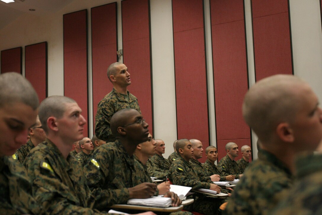 Capt. Michael J. Standafer, company commander, Company H, 2nd Recruit Training Battalion, gives a class on ethics to recruits of Co. H aboard Marine Corps Recruit Depot San Diego March 6. 