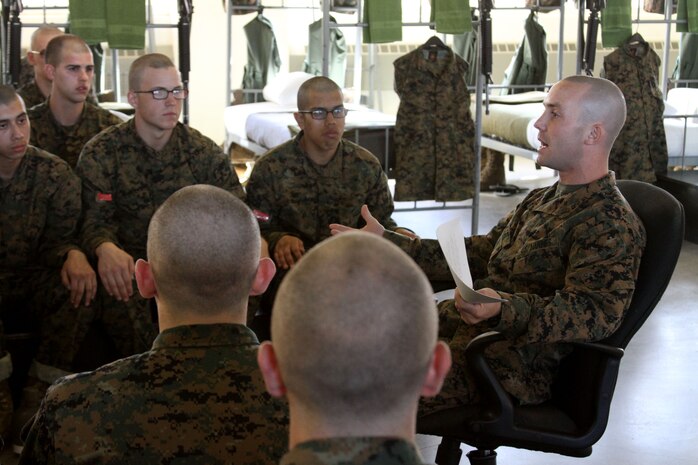 Sgt. Joshua P. McGee, senior drill instuctor, Platoon 1062, Company D, 1st Recruit Training Battalion, Recruit Training Regiment, speaks to his platoon during core values class. Core values class is a tool used to let recruits that a higher standard of personal conduct is expected of them once they become United States Marines.