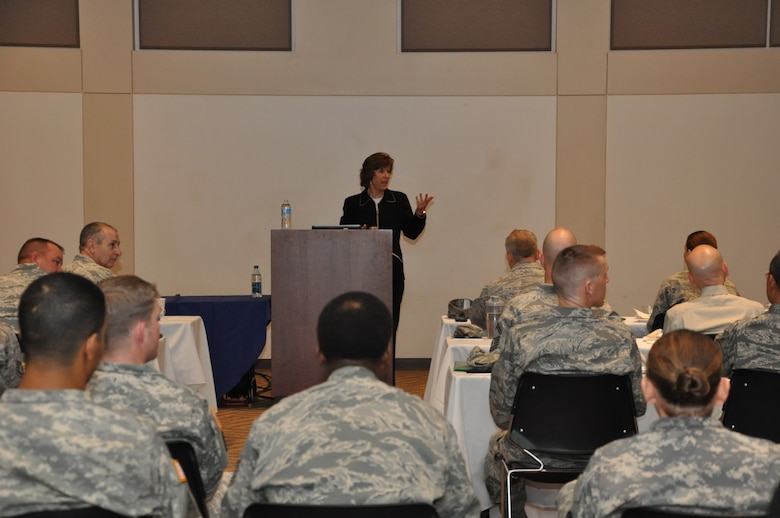 Anne Munch, a consultant and an advocate for victims of domestic violence, sexual assault and stalking, speaks to more than 150 service member and civilian leaders during a presentation March 13, 2013, in the Leadership Development Center on Buckley Air Force Base, Colo. The former prosecutor talked to leaders from the 460th Space Wing, 140th Wing Air National Guard, Aerospace Data Facility-Colorado and Colorado Army National Guard, as well as representatives from the Sexual Assault Prevention and Response Programs. (U.S. Air Force photo by Staff Sgt. Kali L. Gradishar/Released)