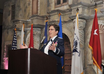 Brig. Gen. Theresa C. Carter, JBSA and 502nd Air Base Wing commander, speaks at the JBSA annual awards ceremony, which was the first joint annual awards ceremony where all services – Army, Marines, Navy, Air Force and Coast Guard – were represented in the 10 overall categories, with 37 service members and government civilian employees honored together.  The event took place at the Marriott Rivercenter Hotel in downtown San Antonio March 8.  The ceremony, led by Carter, Chief Master Sgt. Jose A. LugoSantiago, JBSA and 502nd ABW command chief, and retired Sgt. Maj. Of the Marine Corps Gene Overstreet, recognized annual award winners for 2012.