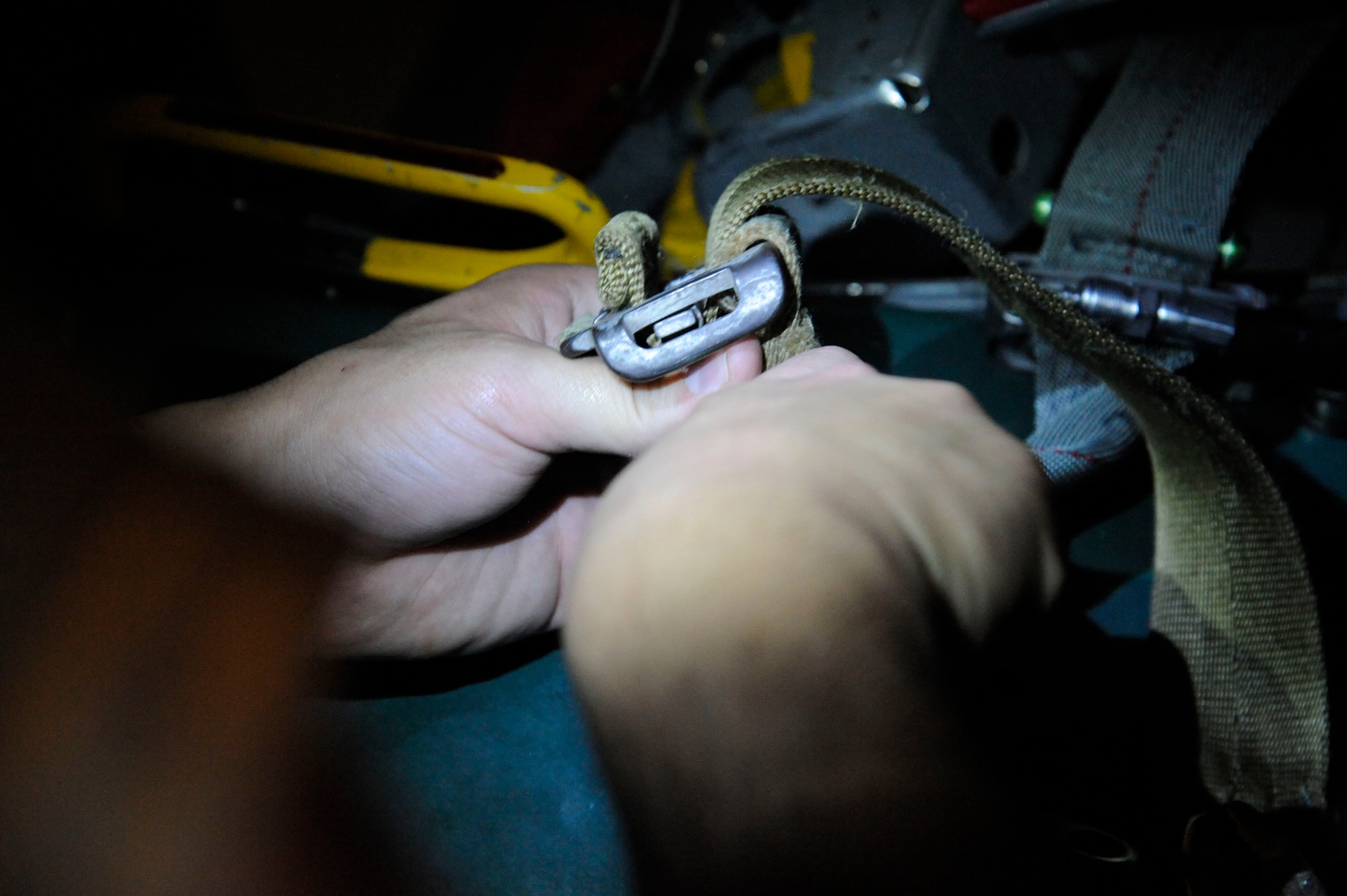 Airman 1st Class Todd Billow, 2nd Operations Support Squadron Aircrew Flight Equipment, installs a survival kit into a Weber B-52H Stratofortress ejection seat on Barksdale Air Force Base, La., March 14. The kits include life-saving equipment in the event of an egress to include flares, sea dye, a strobe light, tourniquet, knife and candle. (U.S. Air Force photo/Airman 1st Class Andrew Moua)