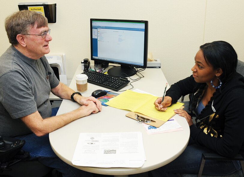 Kirtland AFB Tax Center volunteer Dan Dolan, left, helps Senior Airman Kanyesha Hardin, 377th Mission Support Group, prepare an income tax return March 13. The Kirtland AFB Tax Center will be open through April 12 to provide free tax-filing services to eligible customers (E-6s and below, O-3s and below, and retirees with gross income of $60,000 and below.) Hours of operation will be from 9 a.m. to 2 p.m. Tuesdays through Fridays, by appointment. The Tax Center is in the Consolidated Support Building, between the Military Personnel Section and the Defense Biometric Identification System office. For the most part, Tax Center volunteers will be filing electronic tax returns, which means faster refunds for those who get refunds. Call 853-1700 to make an appointment. 