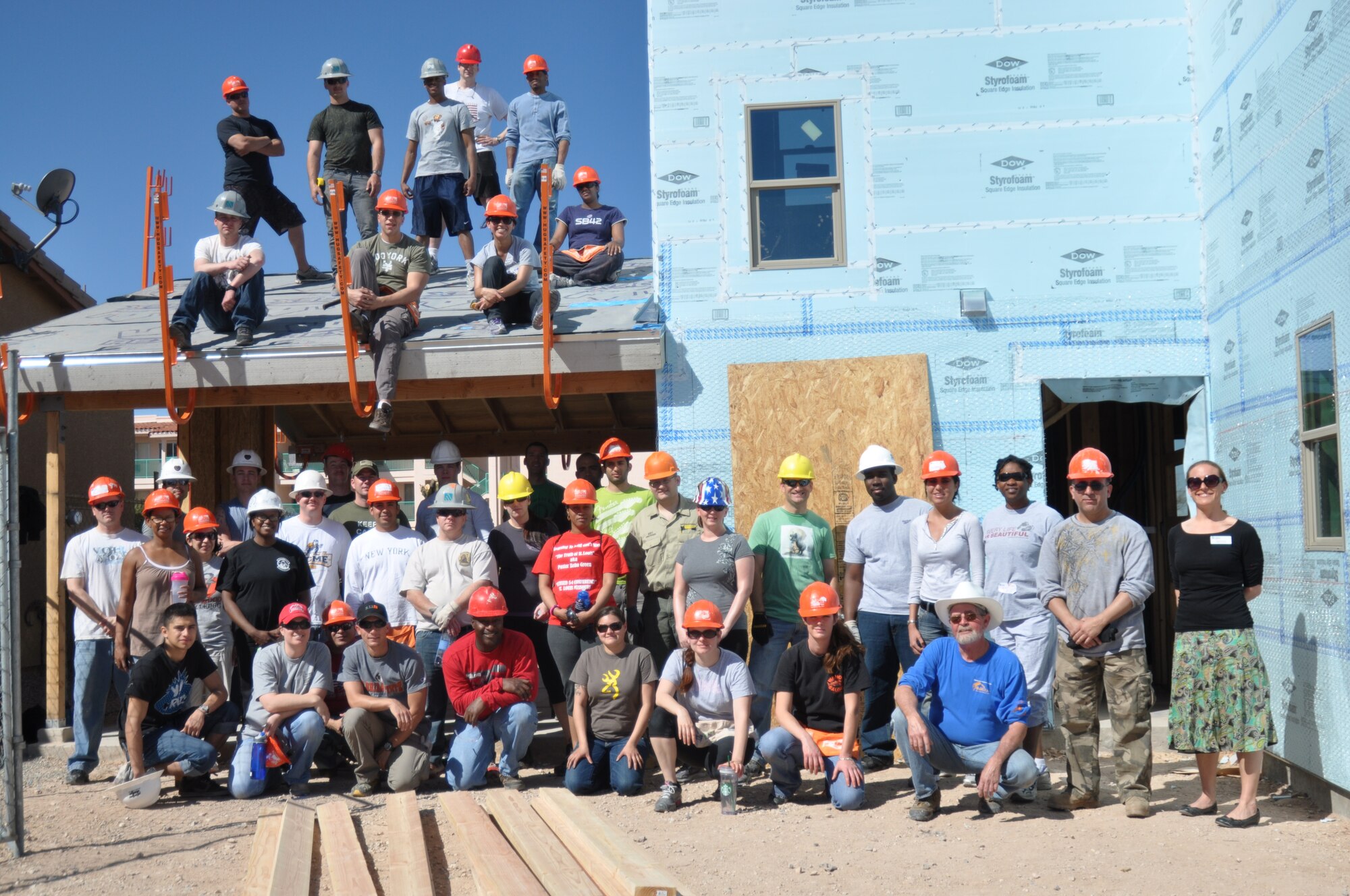 More than 45 Airmen from Davis-Monthan AFB came together to donate six hours of their off-duty time to build homes for Habitat for Humanity in Tucson, Ariz., March 14. (USAF photo by Master Sgt. Kelly Ogden/Released). 