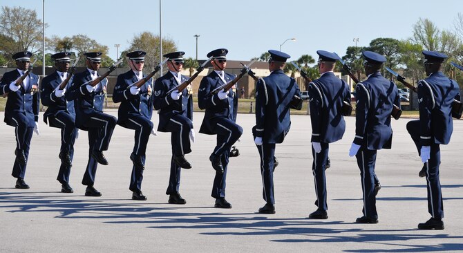 The Air Force Honor Guard Drill Team from Bolling Air Force Base, Washington D.C. performed at the Airey NCO Academy track pad March 13. The demonstration was part of their aggressive recruitment campaign. (U.S. Air Force photo by Airman 1st Class Alex Echols)