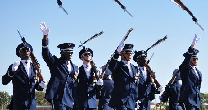 The Air Force Honor Guard Drill Team from Bolling Air Force Base, Washington D.C. performed at the Airey NCO Academy track pad March 13. The demonstration was part of their aggressive recruitment campaign. (U.S. Air Force photo by Airman 1st Class Alex Echols)