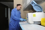 Tech. Sgt. Brenda Torres, 359th Medical Support Squadron Biomedical Laboratory Flight technician, processes urinalysis samples at the Joint Base San Antonio-Randolph Medical Clinic laboratory. (U.S. Air Force photo by Melissa Peterson)
