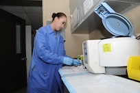 Tech. Sgt. Brenda Torres, 359th Medical Support Squadron Biomedical Laboratory Flight technician, processes urinalysis samples at the Joint Base San Antonio-Randolph Medical Clinic laboratory. (U.S. Air Force photo by Melissa Peterson)

