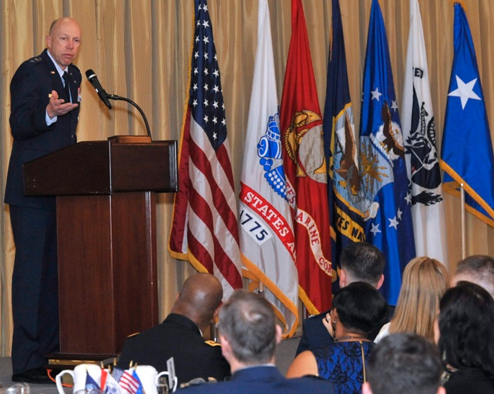 Chaplain (Maj. Gen.) Howard D. Stendahl, Chief of Chaplains, Headquarters U.S. Air Force, speaks on the role of a military chaplain, to serve all regardless of their beliefs, to a full-capacity crowd during the Joint Base McGuire-Dix-Lakehurst National Prayer Breakfast Mar. 5, 2013, at Tommy B's Community Activities Center on JB MDL, N.J. The National Prayer Breakfast, formerly known as the Presidential Prayer Breakfast, has roots in a rich tradition dating back to 1942 when leaders in the Senate and House of Representatives met weekly for prayer out of concern for the U.S.’s involvement in World War II.  (U.S. Air Force photo by Wayne Russell/Released)