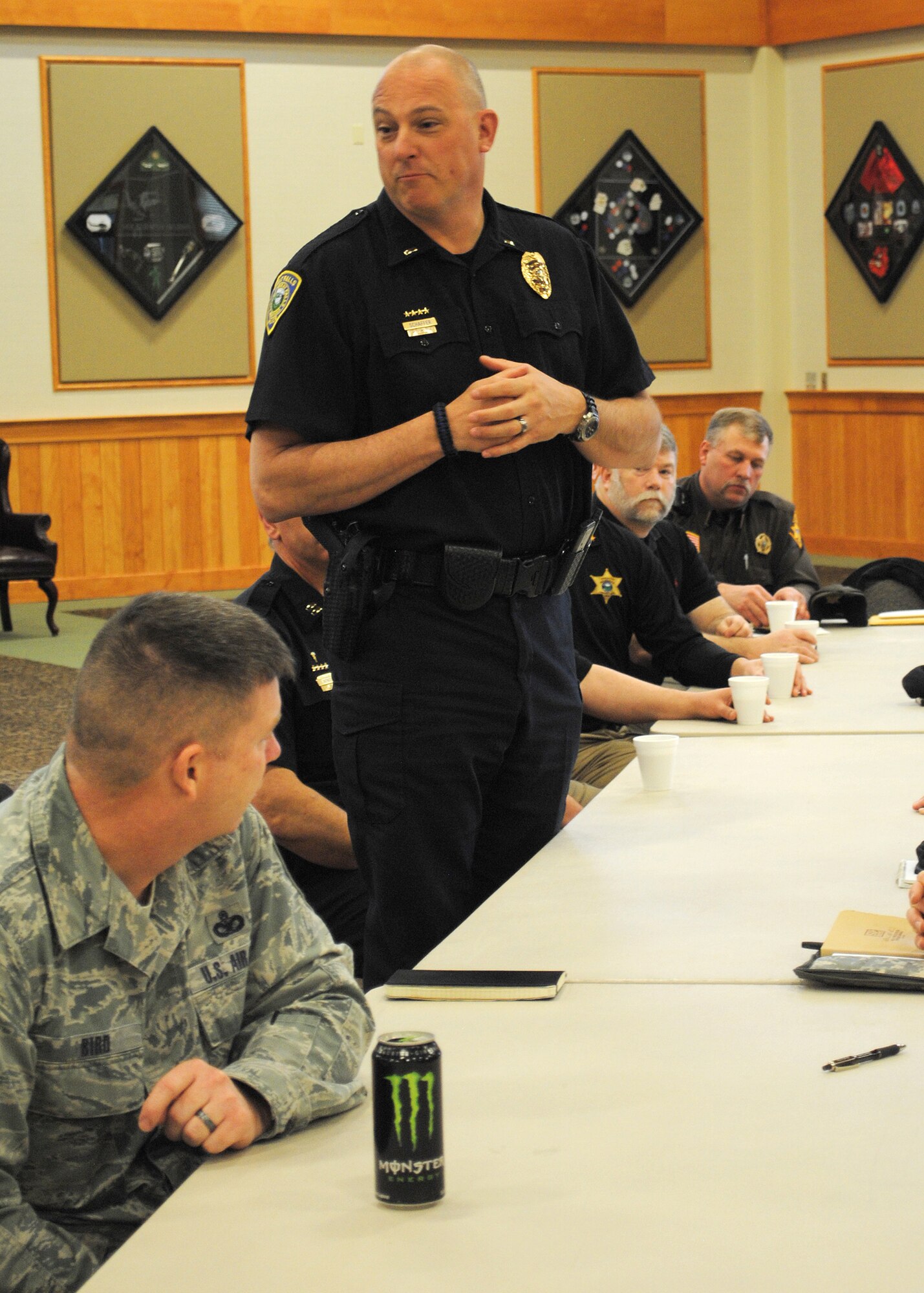 Police Capt. John Schaffer, Great Falls Police Department, introduces himself to the members attending the camaraderie event.  He was one of numerous members of law enforcement agencies throughout the state of Montana to attend the event.  (U.S. Air Force photo/Senior Airman Cortney Paxton)