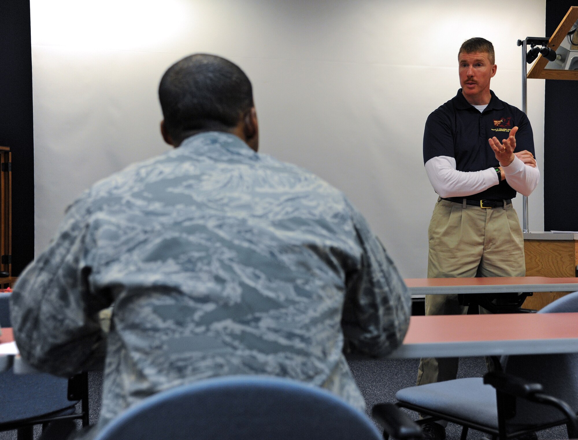 Kirk Clark, 341st Medical Operations Squadron Health and Wellness Center exercise physiologist, discusses the Air Force fitness assessment during a “Be Well” class at the HAWC on March 11. Clark and 341st MDOS HAWC Dietician, Jacquie Maillet, will be introducing “Weapons of Mass Reduction,” a new health management program, to the Malmstrom community March 18 and 19 at the HAWC. (U.S. Air Force photo/Staff Sgt. R.J. Biermann) 