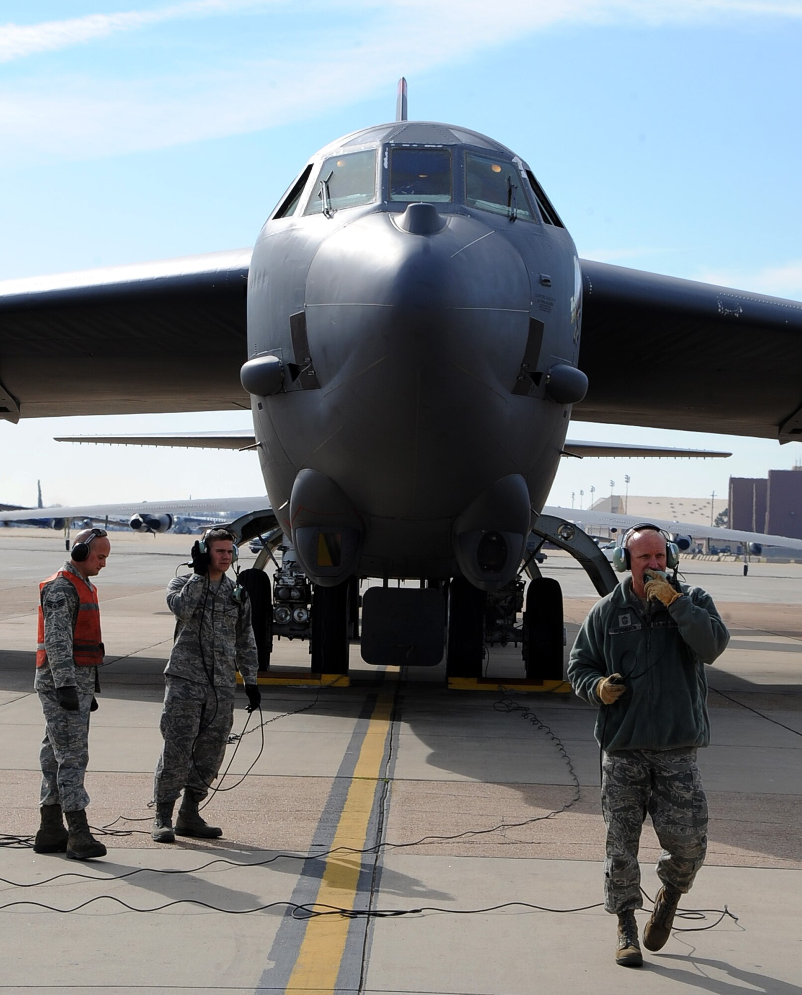 Chief Master Sgt. Brian Hornback, Air Force Global Strike Command command chief, performs a pre-flight inspection with the assistance of Airmen from the 20th Aircraft Maintenance Squadron on Barksdale Air Force Base, La., March 7. Hornback got the opportunity to relive his junior enlisted days as a B-52H Stratofortress crew chief during a recent visit to the 2nd Bomb Wing. (U.S. Air Force photo/Staff Sgt. Jason McCasland)