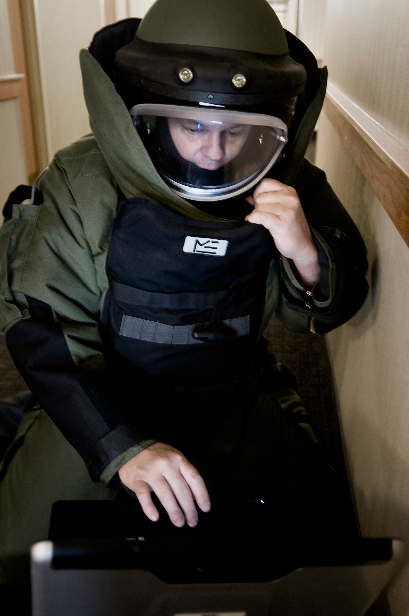 GRISSOM AIR RESERVE BASE, Ind. -- Tech. Sgt. Robert Woods, 434th Civil Engineer Squadron explosives ordnance disposal technician, examines an x-ray of a simulated improvised explosive device during an EOD exercise held here Feb. 21. EOD technicians use portable x-ray technology to determine the composition of various explosive threats and how best to render them safe. (U.S. Air Force photo/Tech. Sgt. Mark R. W. Orders-Woempner)

