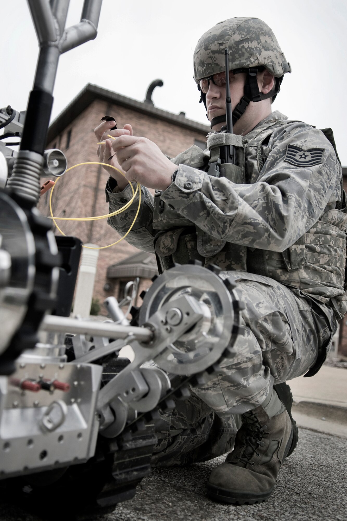GRISSOM AIR RESERVE BASE, Ind. -- Tech. Sgt. Justin Krautkremer, 434th Civil Engineer Squadron explosives ordnance disposal technician, readies an Air Force medium sized robot during an EOD training exercise here Feb. 21. EOD technicians use robots to examine and render safe potential explosive threats. (U.S. Air Force photo/Tech. Sgt. Mark R. W. Orders-Woempner)
