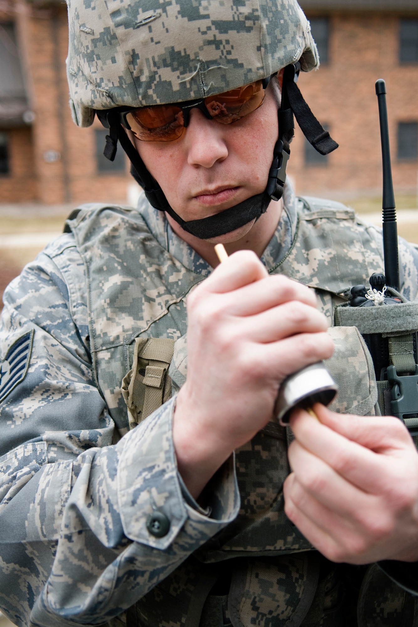 GRISSOM AIR RESERVE BASE, Ind. -- Tech. Sgt. Justin Krautkremer, 434th Civil Engineer Squadron explosives ordnance disposal technician, readies an Air Force medium sized robot during an EOD training exercise here Feb. 21. EOD technicians use robots to examine and render safe potential explosive threats. (U.S. Air Force photo/Tech. Sgt. Mark R. W. Orders-Woempner)
