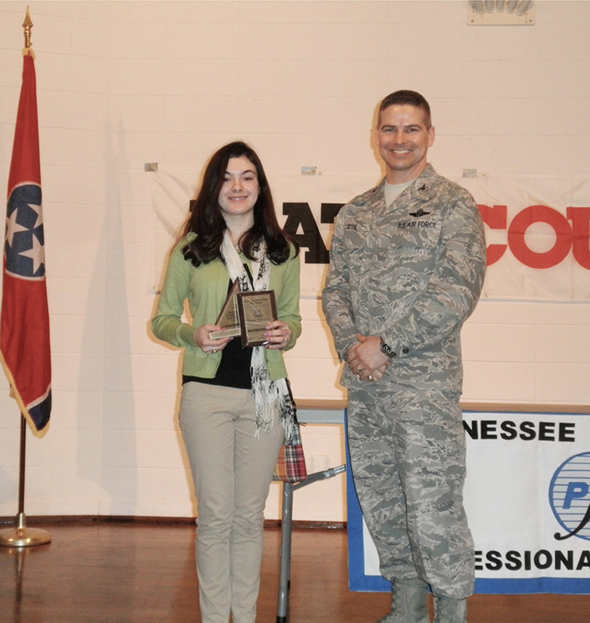 From left, Arnold Engineering Development Complex Commander, Col. Raymond Toth with West Middle School’s Morgan Anderson, first place individual. (Photo provided)