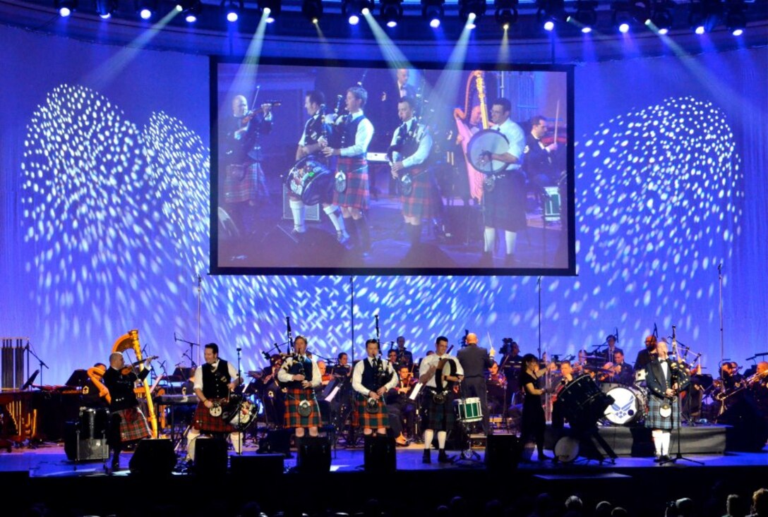 The Air Force Orchestra and Sr. Amn. Adam Tianello perform with The Rogues at the Guest Artist Series concert on Feb. 24. (A.F. photo by Staff Sgt. Perry Aston)