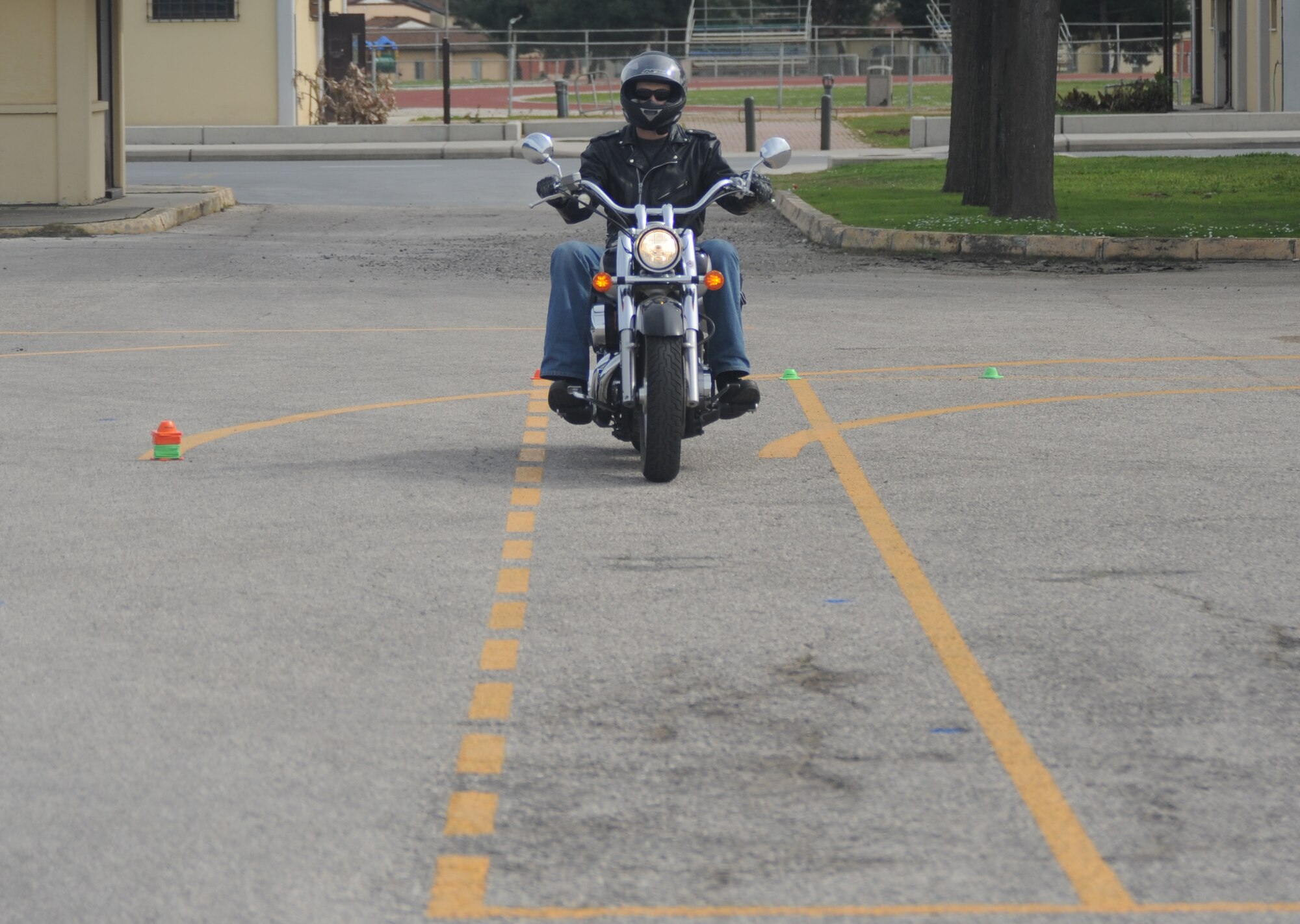 Senior Airman Quinton Jones, 39th Mission Support Group, makes a turn before continuing through a motorcycle safety course March 7, 2013, at Incirlik Air Base, Turkey. The course was designed to put students in several different types of situations that may occur while riding a motorcycle. (U.S. Air Force photo by Staff Sgt. Eric Summers Jr./Released)