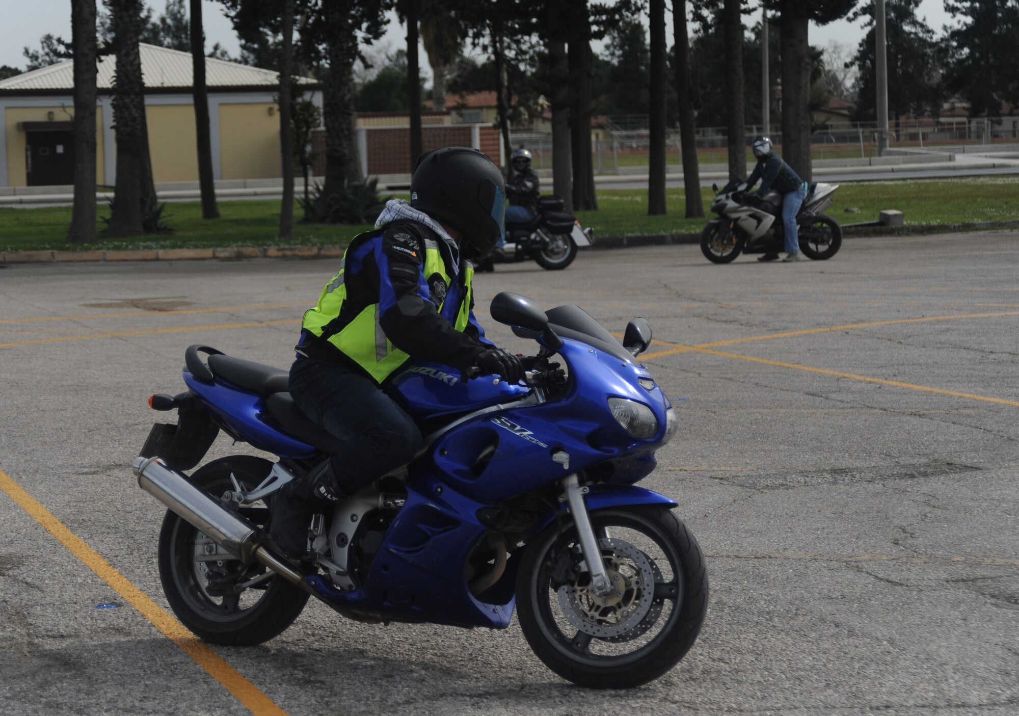 Master Sgt. Jason Morse, American Forces Network Incirlik, drives down the path for the motorcycle course before practicing veering to avoid obstacles March 7, 2013, on Incirlik Air Base, Turkey. Morse and several other drivers practiced quick stops, avoiding objects and other obstacles during a motorcycle training course. (U.S. Air Force photo by Staff Sgt. Eric Summers Jr./Released)