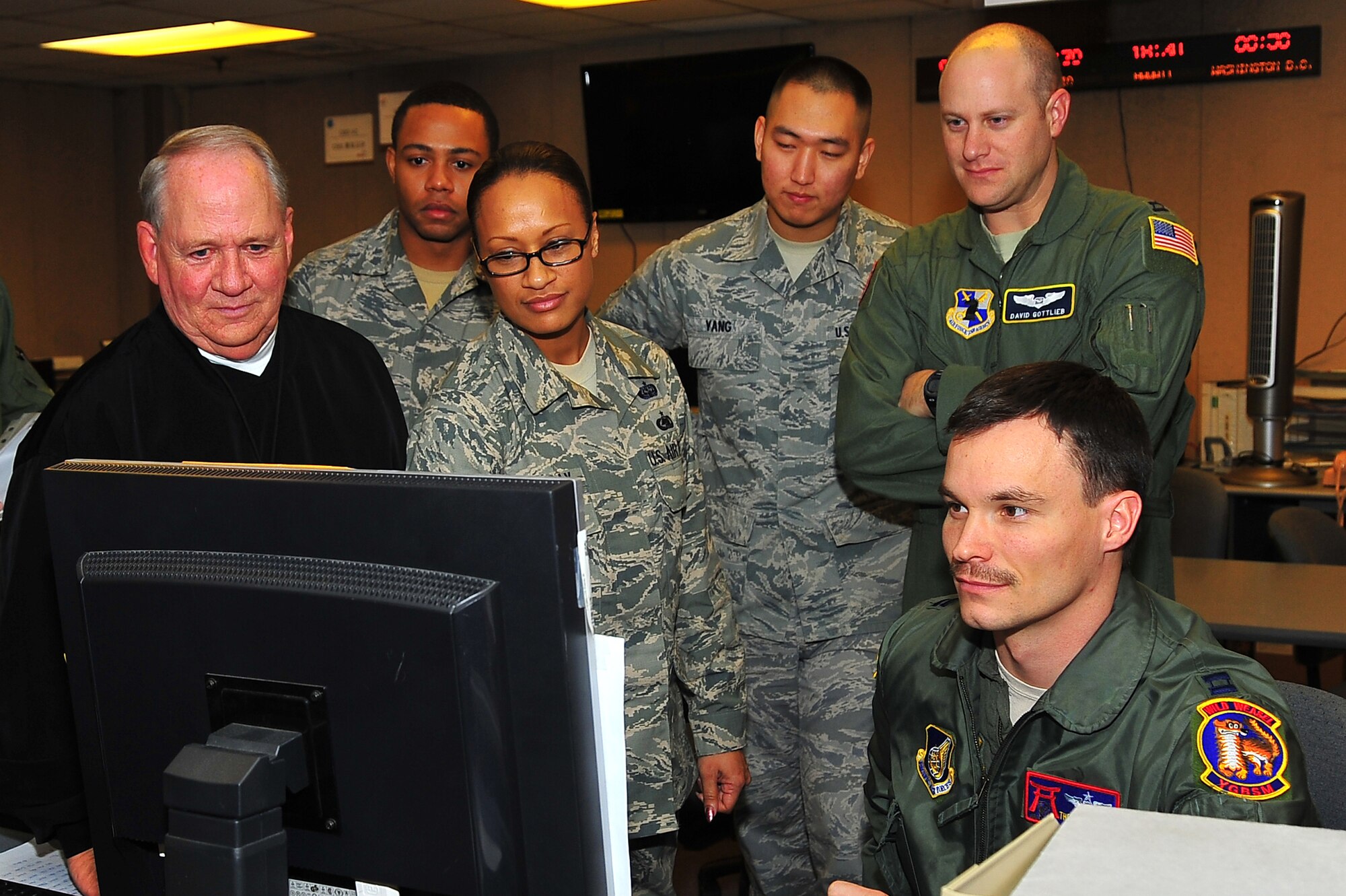 Senior air controllers with the Korea Air Simulation Center, direct the simulated air portion of Key Resolve at bld.  946 on Osan Air Base, Republic of Korea, March 12, 2013. Exercise Key Resolve is an annual joint training exercise for ROK and US forces to ensure combat readiness.  (U.S. Air Force photo/Staff Sgt. Emerson Nuñez)