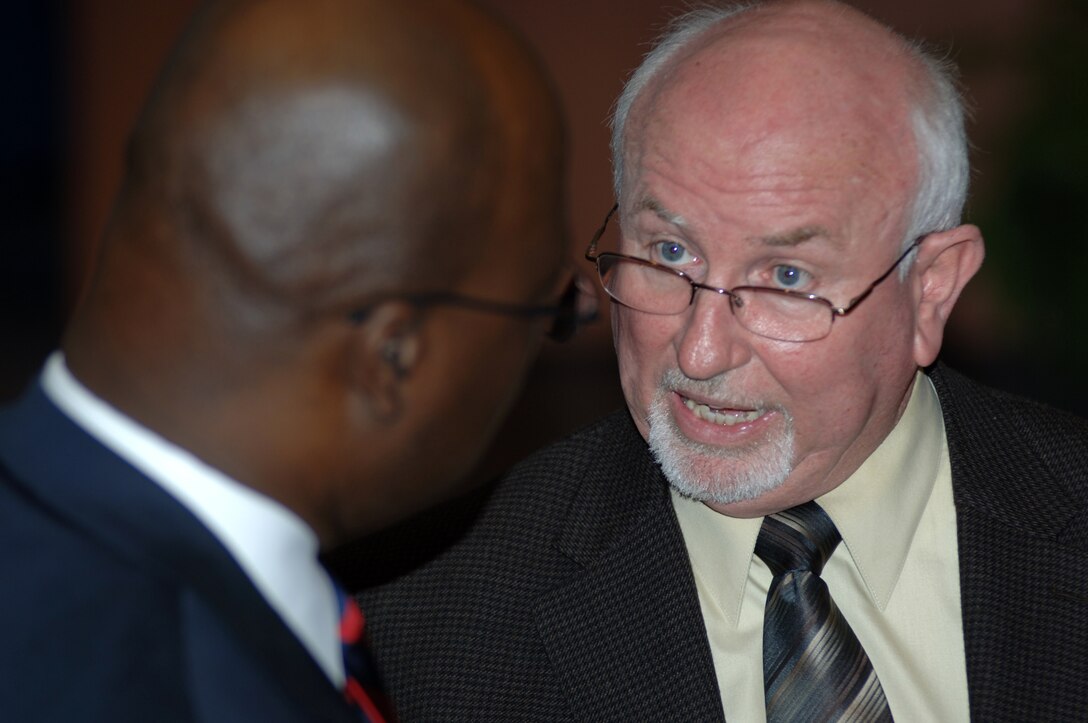 Roy Rossignol (Right), chief of the U.S. Army Corps of Engineers Nashville District Business Office, talks with a participant at a Small Business Training Forum, March 8, 2012, at the Tennessee State University Avon Williams Campus in Nashville, Tenn. The Nashville District participated and the TSU Development Center and Society of American Military Engineers along with many other sponsors helped organize the event.