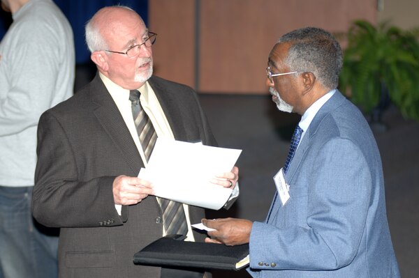 Roy Rossignol (Left), chief of the U.S. Army Corps of Engineers Nashville District Business Office, talks with a participant at a Small Business Training Forum, March 8, 2012, at the Tennessee State University Avon Williams Campus in Nashville, Tenn. The Nashville District participated and the TSU Development Center and Society of American Military Engineers along with many other sponsors helped organize the event.