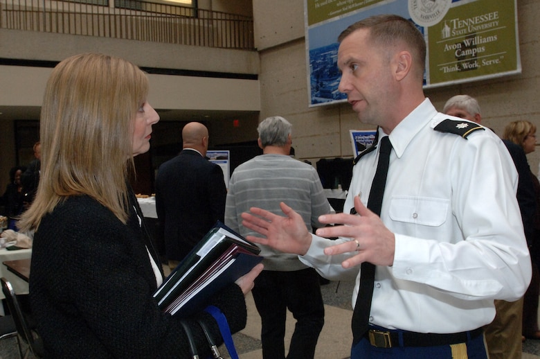 Lt. Col. James A. DeLapp, U.S. Army Corps of Engineers Nashville District commander, talks with Andrea Krasnoff, a senior business consultant and director of consultant services at TenStep, Inc., during the Small Business Training Forum March 13, 2013 at the Tennessee Small Business Center on the Avon Williams Campus at Tennessee State University in Nashville, Tenn. (USACE photo by Leon Roberts)