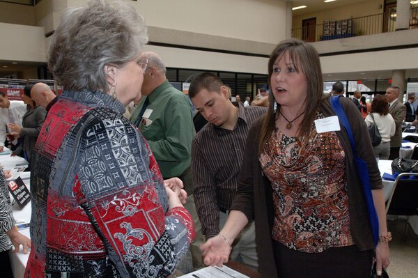 Beryl Newsome (Left), supervisory contract specialist for the U.S. Army Corps of Engineers Nashville District, provides information to Sandra Ellis of Separate Winds, Inc., at the Tennessee Small Business Center on the Avon Williams Campus at Tennessee State University in Nashville, Tenn., during the Small Business Training Forum March 13, 2013. (USACE photo by Leon Roberts)