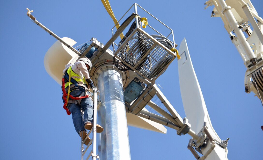 A contractor makes adjustments to a wind turbine 120 feet above Buckhorn Recreation Area at Black Butte Lake, a U.S. Army Corps of Engineers Sacramento District park, near Orland, Calif. The turbine can generate 11 kilowatts of energy to help supply the needs of campers at Black Butte Lake.