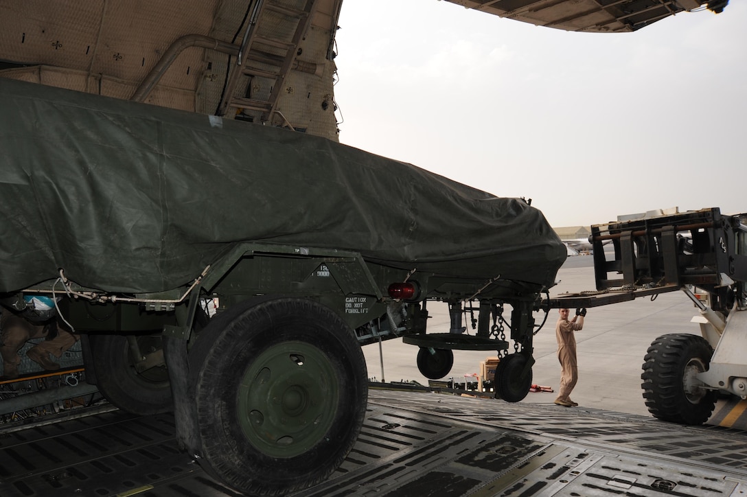 Staff Sgt. Matthew Dolan, a loadmaster assigned to Travis Air Force Base, unloads an AN/TPS-59 from a C-5 Galaxy in Southwest Asia Feb. 28, 2013. The AN/TPS-59 is dual-purpose long range radar deployed to the region in support of U.S. Air Forces Central Command’s Integrated Air Defense and Missile shield. The AN/TPS-59 is one of the U.S. military’s most powerful radars and the systems inherit mobility allows for rapid worldwide deployment. (U.S. Air Force photo by Senior Master Sgt. George Thompson)