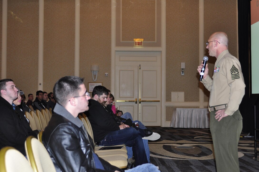 Sgt. Maj. Michael E. Sprague, Force Headquarters Group, Marine Forces Reserve, sergeant major, addresses attendees of the first of two sessions during an Individual Ready Reserve Mega Muster at the Hilton Alexandria Mark Center on March 9. This muster is one of 10 held nationwide annually in order to meet the Marine Corps' responsibilities to ensure members of the IRR are medically capable of reintegration and that their contact information is current. 