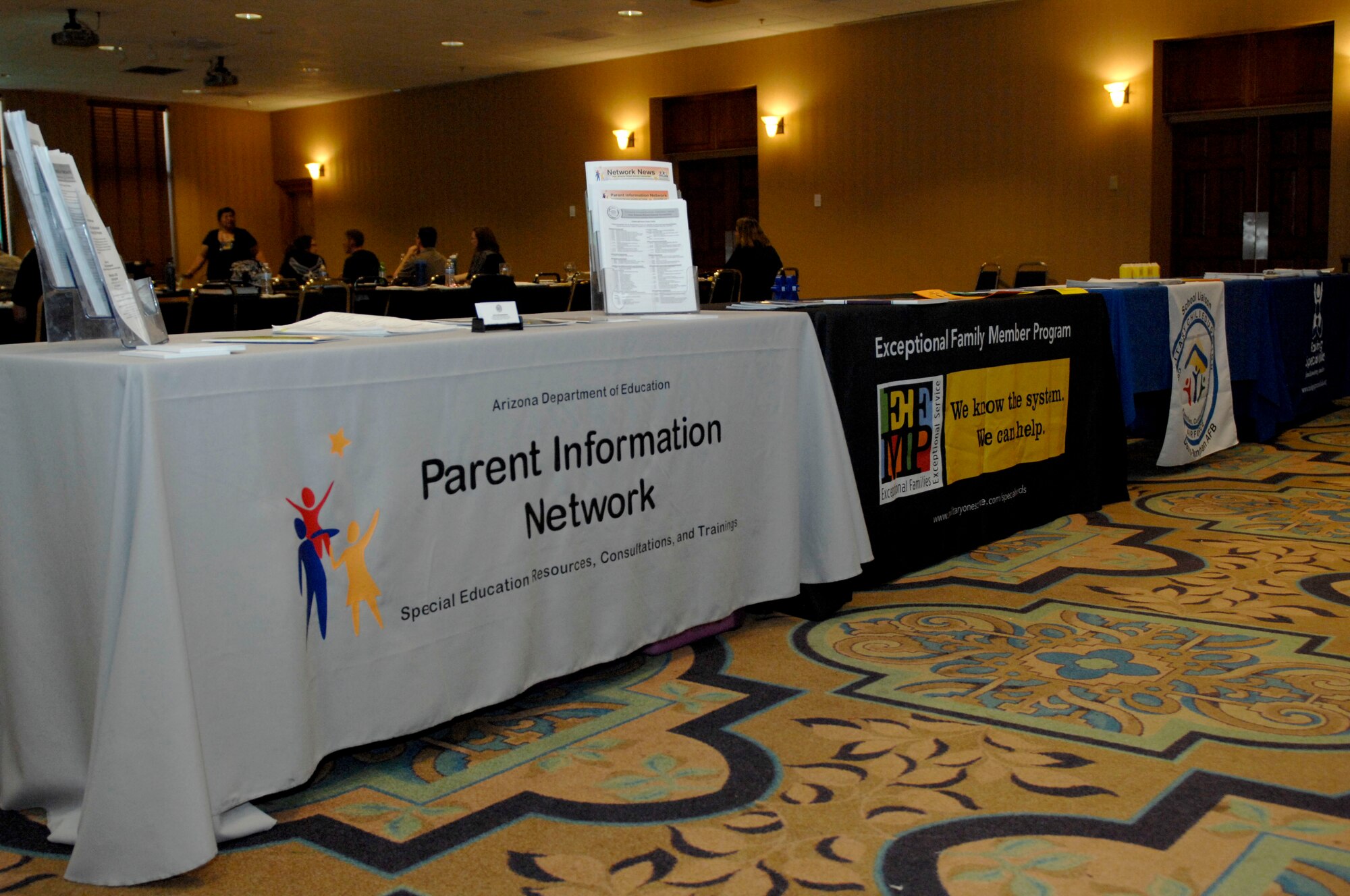Tables hold pertinent information for parents with dependents in the Exceptional Family members Program during the Specialized Training of Military Parents held at the Mirage Club at Davis-Monthan Air Force Base, Ariz., March 14-15, 3012. The training was provided to educate parents on the services, both military and civilian, provided for children with disabilities. (U.S. Air Force photo by Senior Airmen Saphfire Cook/Released)