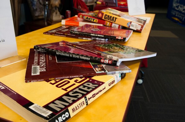 Study guides for the college level examination program (CLEP) and defense activity for non-traditional education support (DANTES) exams sit on display at the Clep-a-thon and education fair at Moody Air Force Base, Ga., March 12, 2013. The main goal of the fair was to get as many people possible to sign up for CLEP or DANTES exams. (U.S. Air Force photo Staff Sgt. Melissa K. Mekpongsatorn/Released)