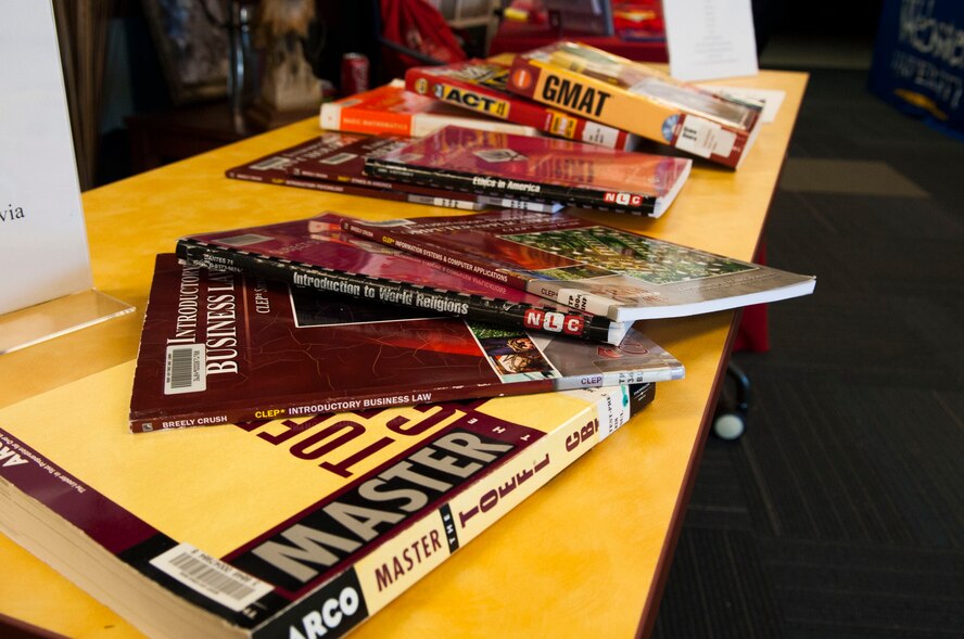 Study guides for the college level examination program (CLEP) and defense activity for non-traditional education support (DANTES) exams sit on display at the Clep-a-thon and education fair at Moody Air Force Base, Ga., March 12, 2013. The main goal of the fair was to get as many people possible to sign up for CLEP or DANTES exams. (U.S. Air Force photo Staff Sgt. Melissa K. Mekpongsatorn/Released)
