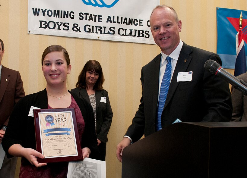 Amanda Markus, 16, holds the plaque presented to her by Gov. Matt Mead March 5 upon her being named Wyoming Military Youth of the Year by the Wyoming State Alliance of Boys and Girls Clubs. Markus was honored during a luncheon in the Cheyenne Holiday Inn and now goes on to compete at the regional level against military youths from other states. Her father is Jeff Markus, a civilian with the 90th Missile Maintenance Squadron on F. E. Warren Air Force Base. (U.S. Air Force photo by R.J. Oriez)