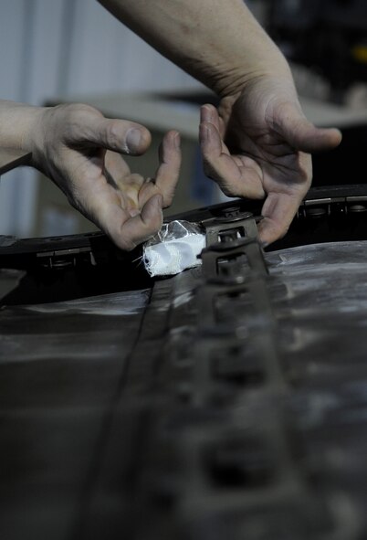 WHITEMAN AIR FORCE BASE, Mo. – U.S. Air Force Tech. Sgt. Jim Gargano, 509th Maintenance Squadron metals technology assistant section chief, prepares to weld a connector of a B-2 Spirit Bomber tail pipe liner, Mar. 6. Aircraft part production mostly incorporates aspects that will accompany fabrication work, such as precision measurements and jobs like bushing, installation and smaller maintenance on the aircraft. (U.S. Air Force photo/Staff Sgt. Alexandra M. Boutte) (RELEASED)