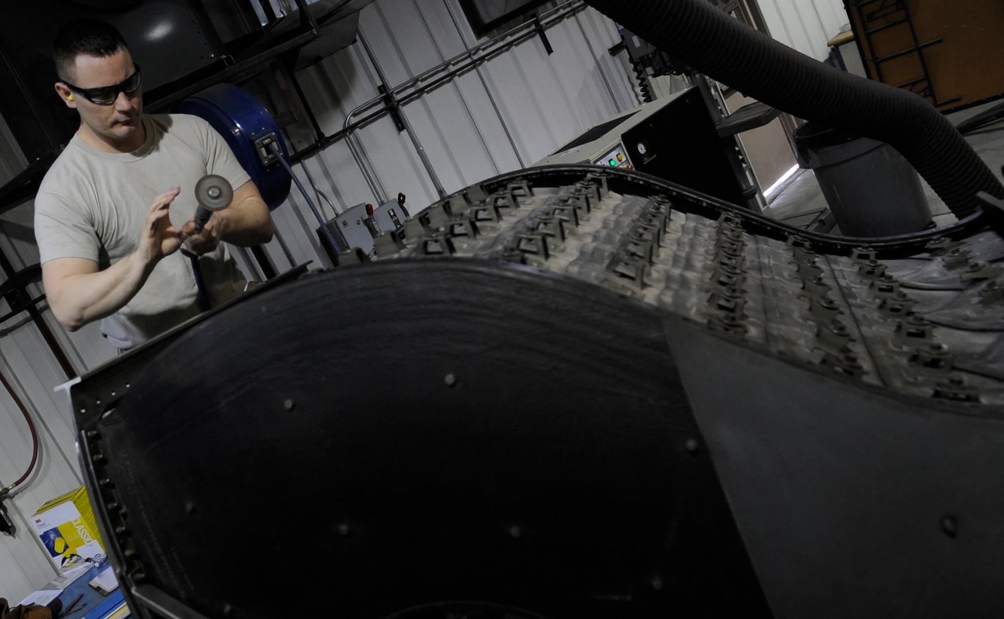 WHITEMAN AIR FORCE BASE, Mo. – U.S. Air Force Tech. Sgt. Jim Gargano, 509th Maintenance Squadron metals technology assistant section chief, welds a B-2 Spirit tail pipe liner together, Mar. 6. Connectors on the tail pipe become cracked from vibrations when the aircraft is turned on. (U.S. Air Force photo/Staff Sgt. Alexandra M. Boutte) (RELEASED)