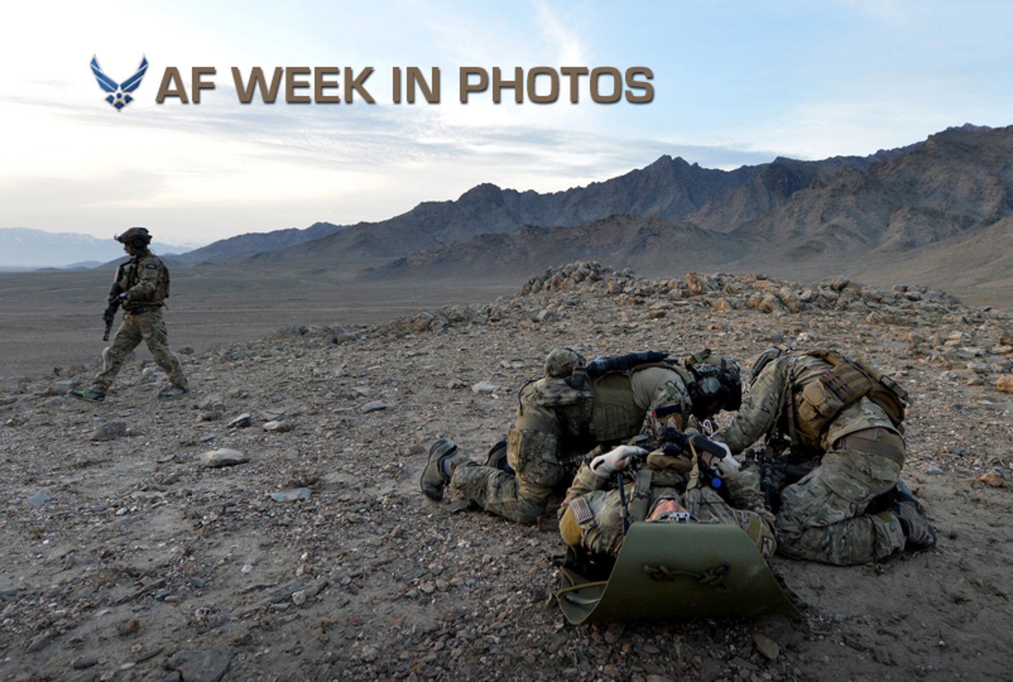 Members of the 83rd Expeditionary Rescue Squadron Guardian Angel attend to a simulated casualty during a training mission March 12, 2013, outside Bagram Airfield, Afghanistan. The 83rd ERQS Guardian Angel is a small tactical unit that trains and executes its mission in personnel recovery throughout eastern Afghanistan. (U.S. Air Force photo/Senior Airman Chris Willis)