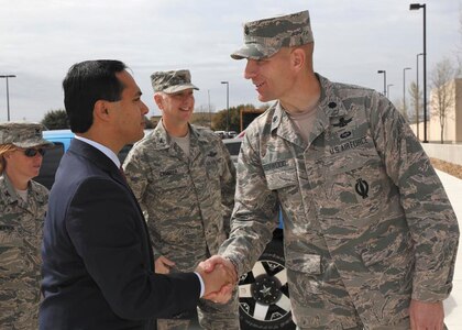 U.S. Rep. Joaquin Castro meets Lt. Col. Jeffrey Greenwood, commander of 323rd Training Squadron while accompanied by Col. Mark D. Camerer, commander of 37th Training Wing, during a tour of the 323rd Training Squadron’s new Airmen Training Complex. (U.S. Air Force photo by Robbin Cresswell/Released)