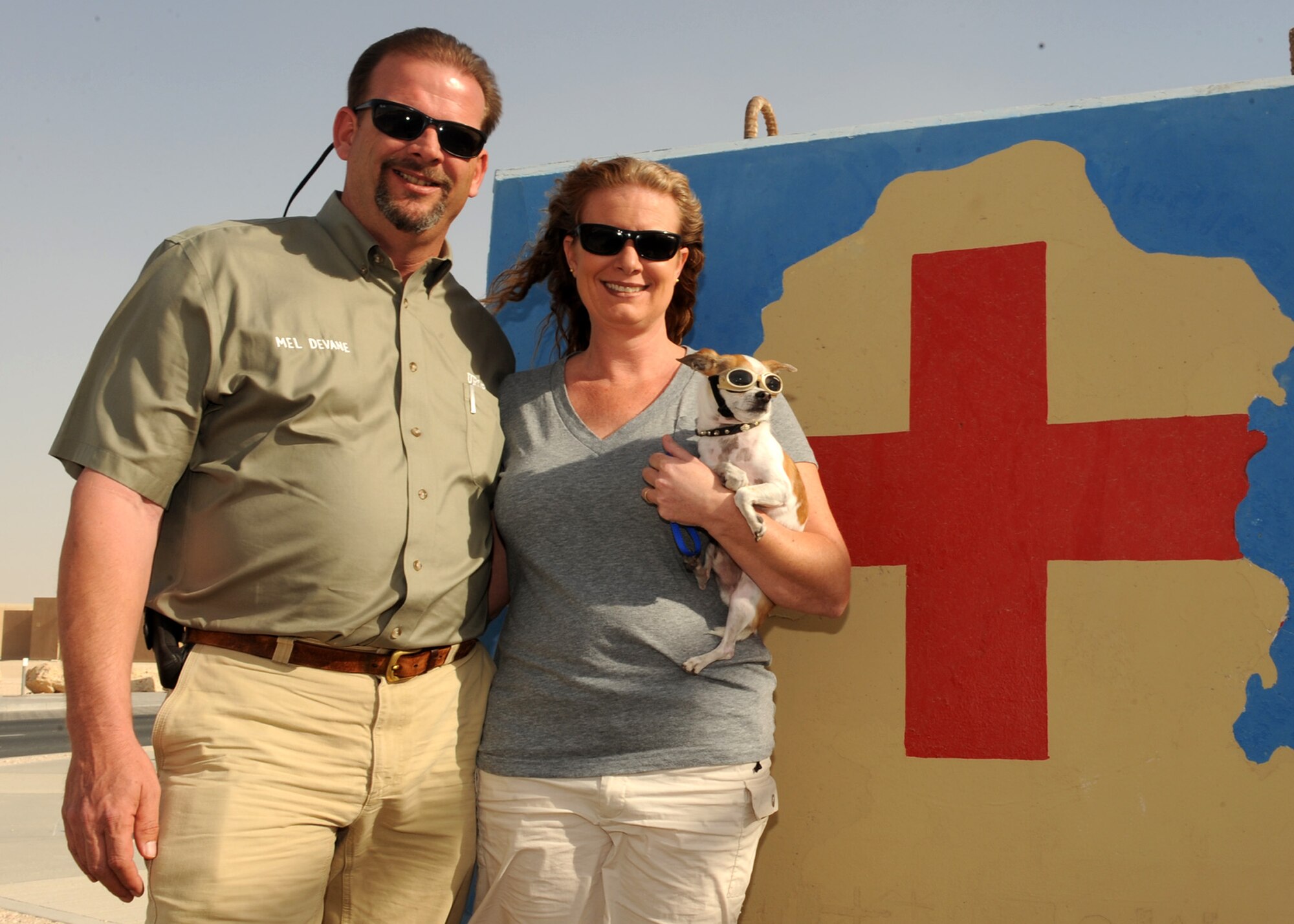 SOUTHWEST ASIA – Balad and his “parents” Melvin and Melissa DeVane make regular morale visits to service members across the installation. As a trained therapy dog, Balad is able to visit patients at the 379th Expeditionary Medical Group Clinic and gives the379th EMDG the distinction of having the first Therapy Dog Program in the AOR. (. (U.S. Air Force photo/Senior Airman Joel Mease)