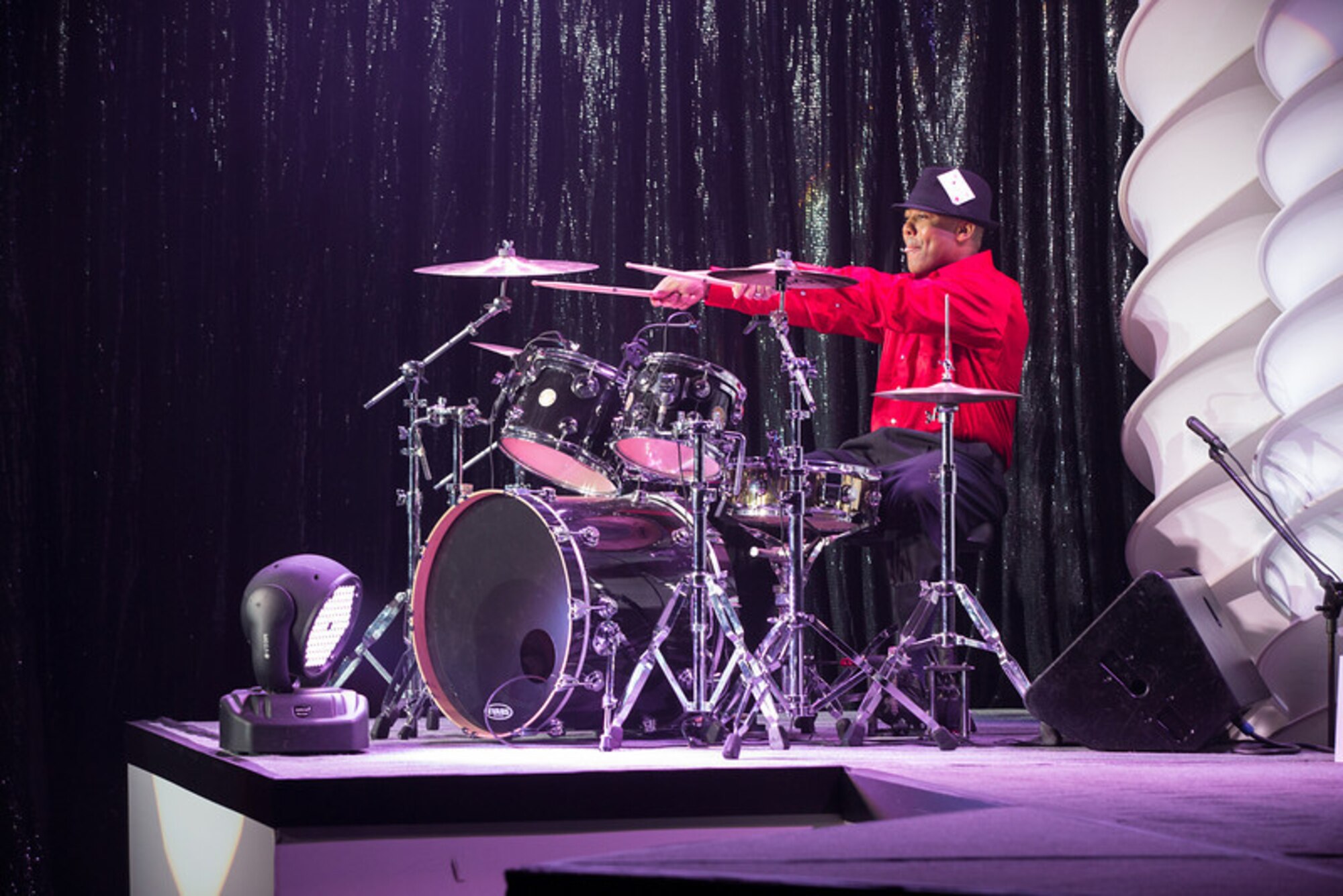 Master Sgt. Mark Washington, 31st Communications Squadron readiness and resources section chief, performs a drum solo during the 2013 Air Force talent search competition held at Lackland Air Force Base, Texas, Feb. 2 – 12, 2013. Washington earned a spot as the technical director for the 2013 Tops in Blue 60th Anniversary tour.  (U.S. Air Force photo/Maj. Chris Burch)