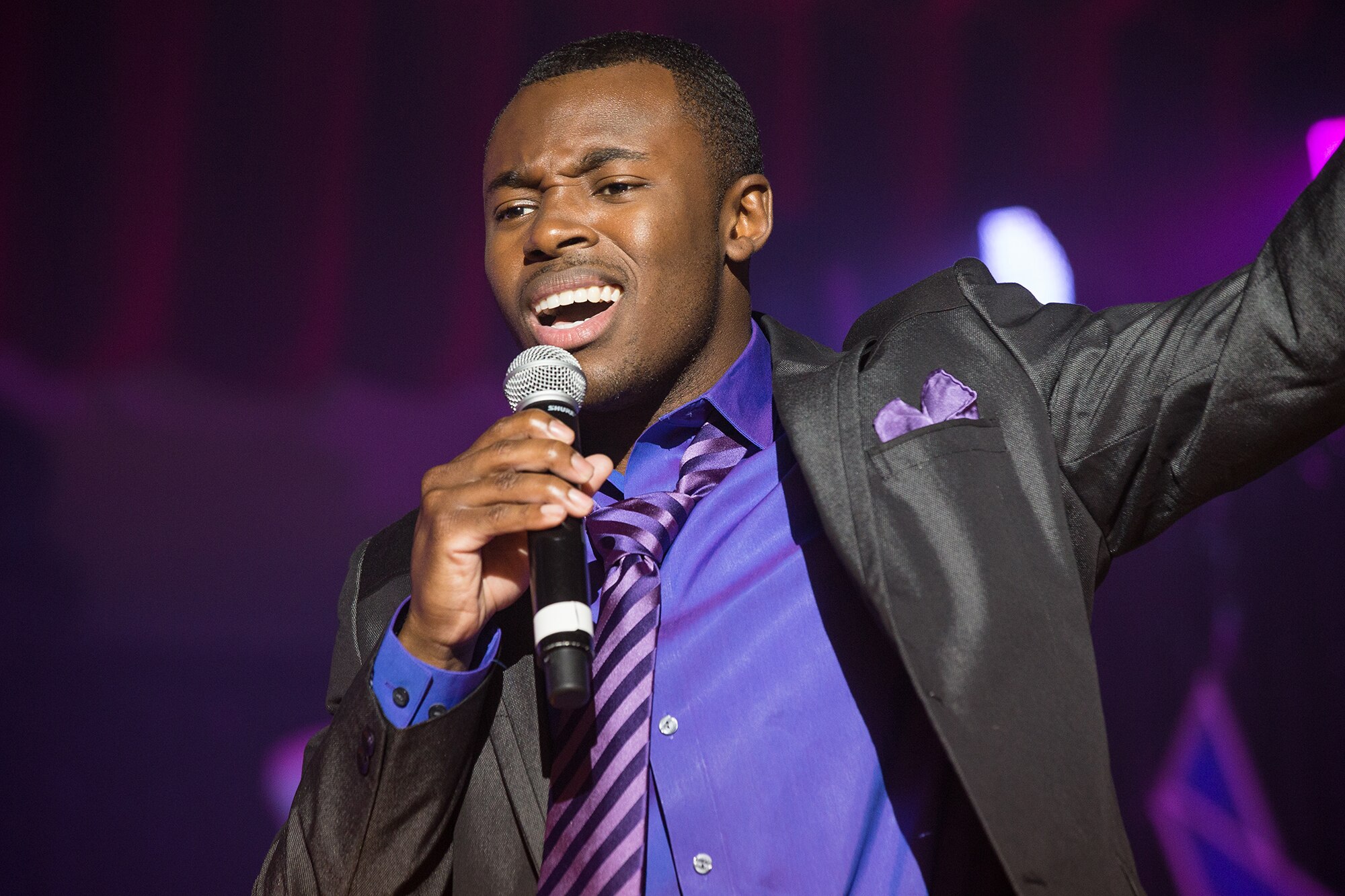 Staff Sgt. Jamal Young, 603rd Air Control Squadron transmission systems journeyman, gives a solo vocal performance during the 2013 Air Force talent search competition held at Lackland Air Force Base, Texas, Feb. 2 – 12, 2013. In the last 60 years TIB has travelled more than 4 million miles to entertain service members throughout the world. The cast has also performed at six World’s Fairs, several Super Bowls and countless TV show appearances. (U.S. Air Force photo/Maj. Chris Burch)