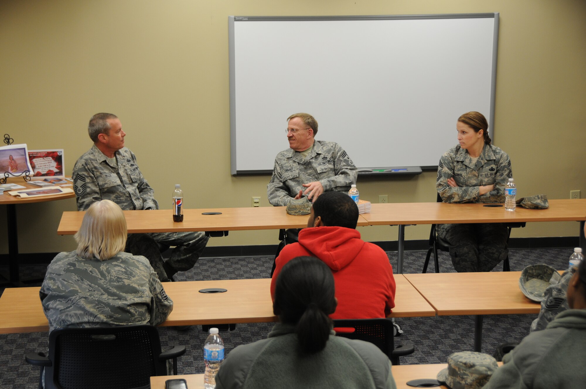 Chief Master Sgt. Jay Ellis, the 192nd Fighter Wing Intelligence Squadron Superintendent, State Command Chief Master Sgt. Jeff Frazier, and Chief Master Sgt. Kim Holloway, the 192nd Operations Group Chief, respond to a question during the first 192nd  FW “Ask a Chief” event held February 10, 2013. Airman from the 192nd FW participated in the event coordinated by the unit’s Junior Enlisted Council. The panel provided an opportunity for airmen ranked E-6 and below to ask questions, receive feedback from the Chiefs and propose ideas that may improve the Va. Air National Guard.