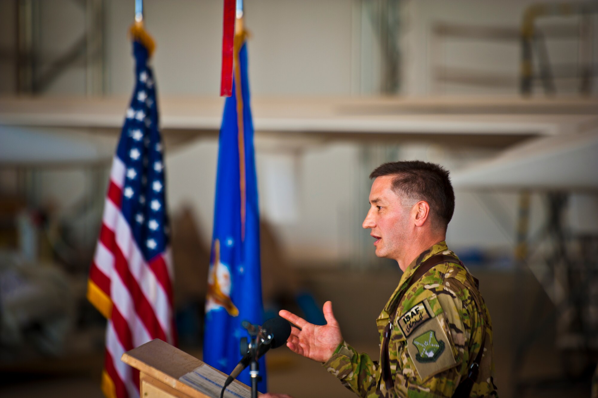 Lt. Col. Robert Finch, 430th Expeditionary Electronic Combat Squadron commander, speaks during an activation ceremony for the squadron at Kandahar Airfield, March 13, 2013. The unit, which flies the E-11A, was previously designated as the 451st Tactical Airborne Gateway. “This deployment is a great opportunity for these warriors to serve their country, and being deployed here during the time this unit converts to a squadron makes it extra special,” he said. (U.S. Air Force photo/Senior Airman Scott Saldukas)