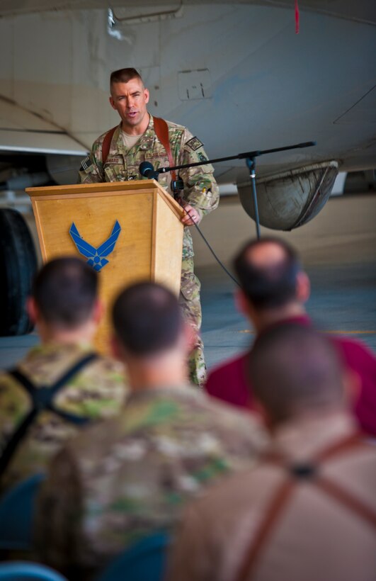 Col. Brook Leonard, 451st Expeditionary Operations Group commander, speaks during an activation ceremony for the 430th Expeditionary Electronic Combat Squadron at Kandahar Airfield, March 13, 2013. The unit, which flies the E-11A, was previously designated as the 451st Tactical Airborne Gateway. “It’s really neat that we can do this given the context of this day and age,” Leonard said. “Right now we’re on the precipice of drawdown and redeployment operations, so to stand up a squadron in this kind of environment is really a privilege. In many ways it speaks to the quality and excellence this unit has exhibited while they were the TAG.” (U.S. Air Force photo/Senior Airman Scott Saldukas)
