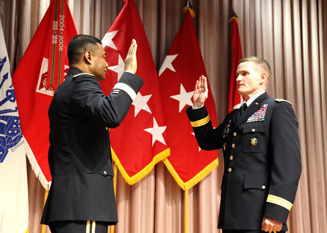 Lt. Gen. Thomas Bostick, Chief of Engineers and the Commanding General of the U.S. Army Corps of Engineers, promotes Kent D. Savre, the North Atlantic Division Commander, to the rank of Brigadier General March 15 in a ceremony in Washington, D.C.