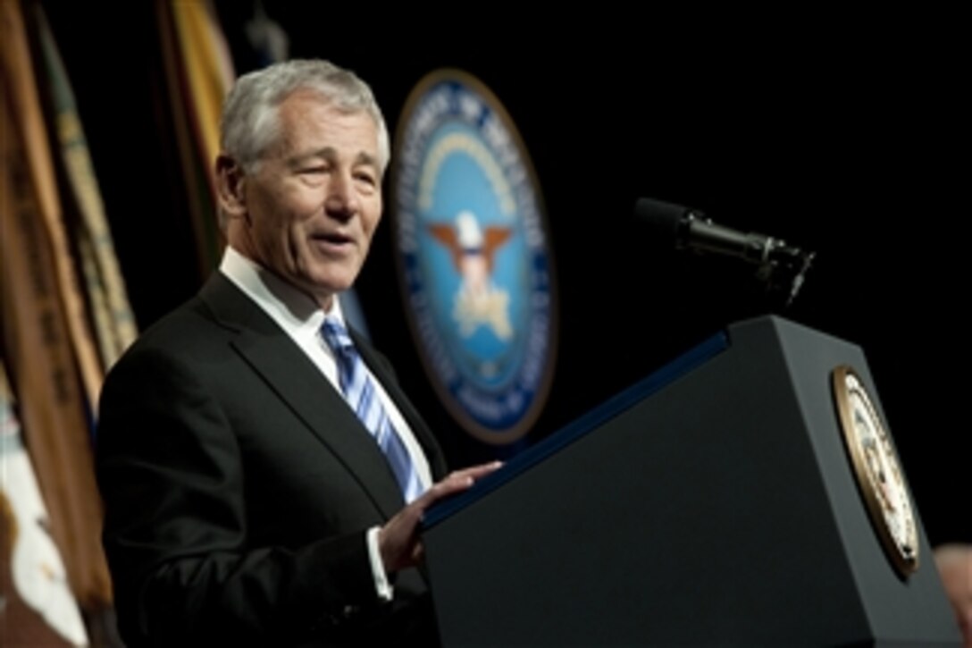 Secretary of Defense Chuck Hagel addresses the audience during a welcome and ceremonial swearing in ceremony in the Pentagon on March 14, 2013.  Vice President Joe Biden administered the oath of office earlier to Hagel as the 24th secretary of defense.  